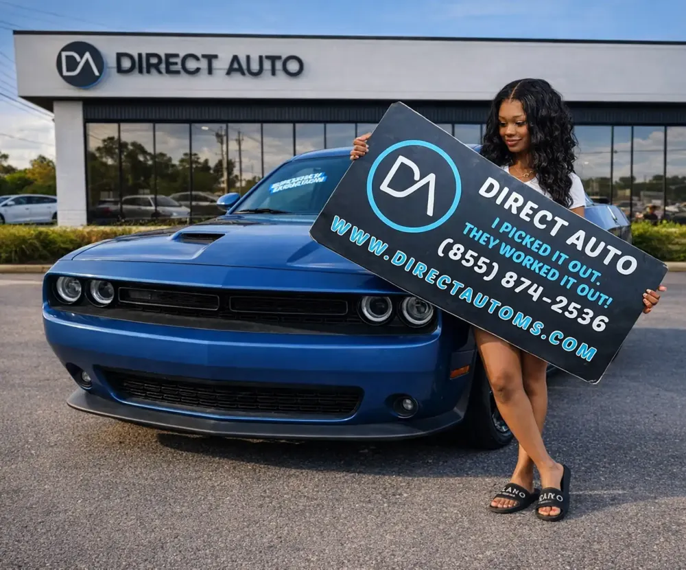 Direct Auto customer with a blue Challenger
