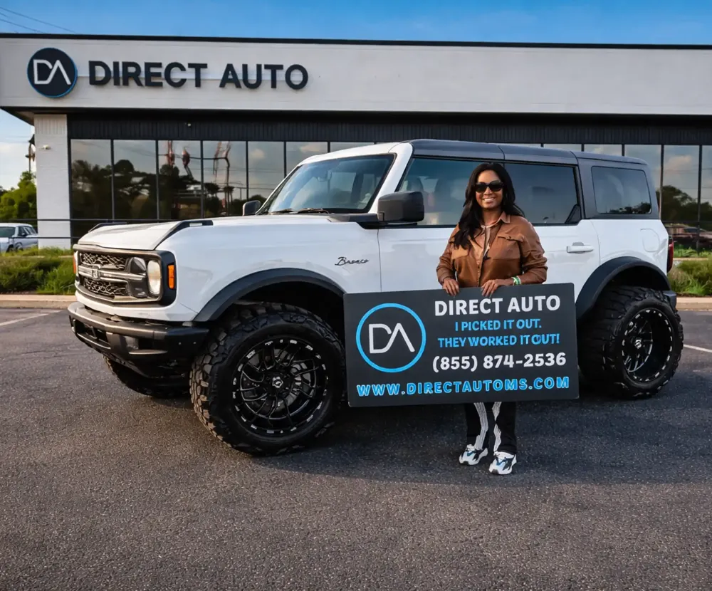 Direct Auto customer with a white Bronco